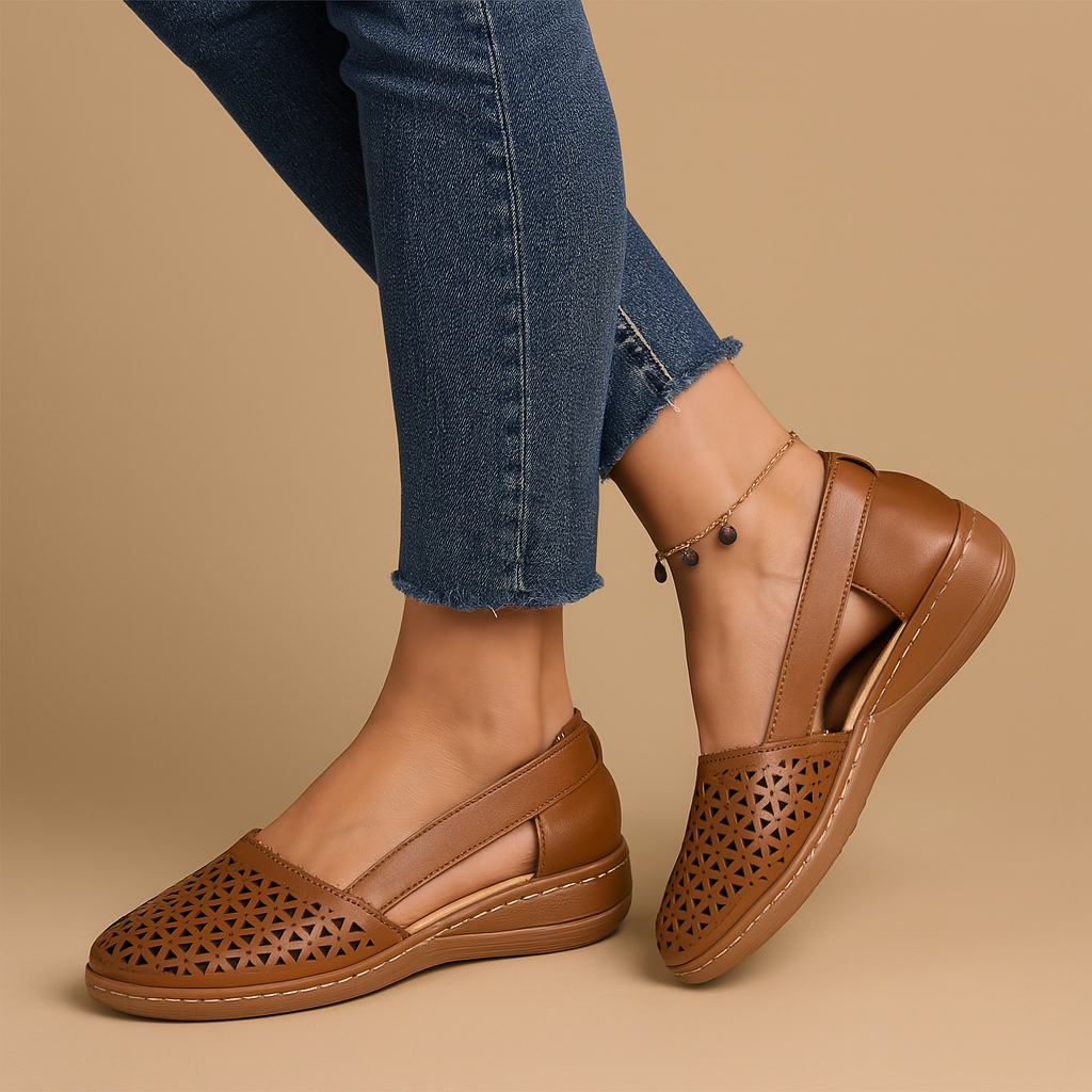 Women’s breathable slip-on shoes with cut-out details, flexible lightweight sole, and casual summer style in a comfortable design.