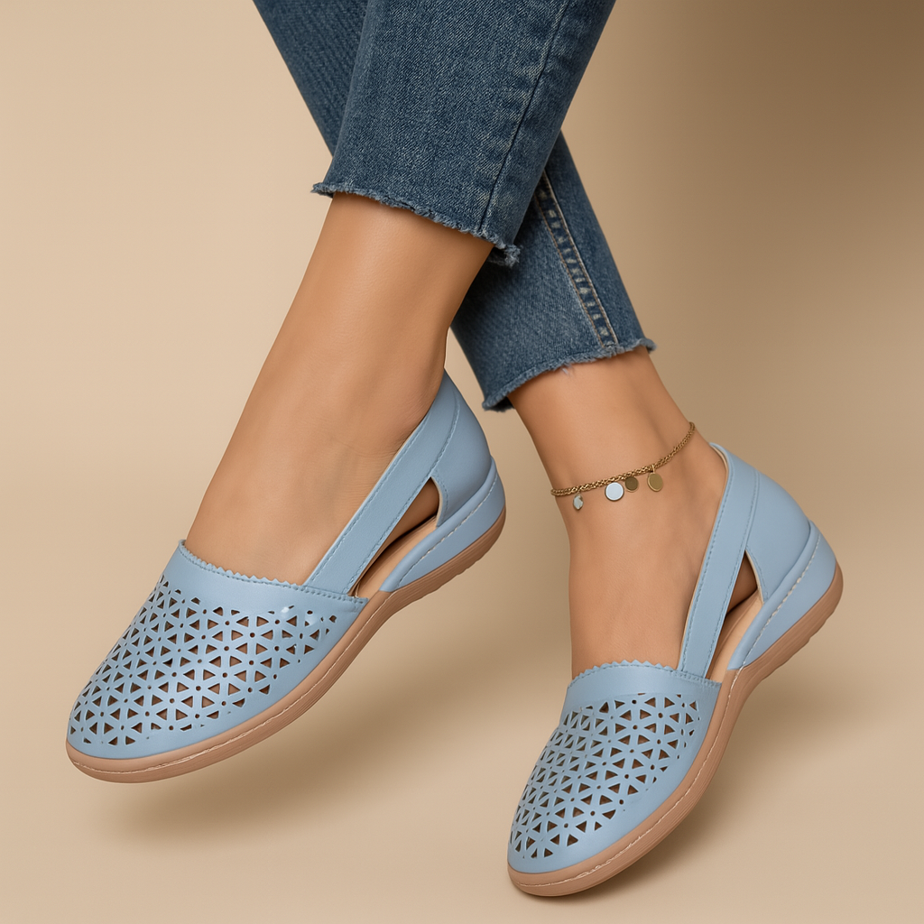 Women’s breathable slip-on shoes with cut-out details, flexible lightweight sole, and casual summer style in a comfortable design.