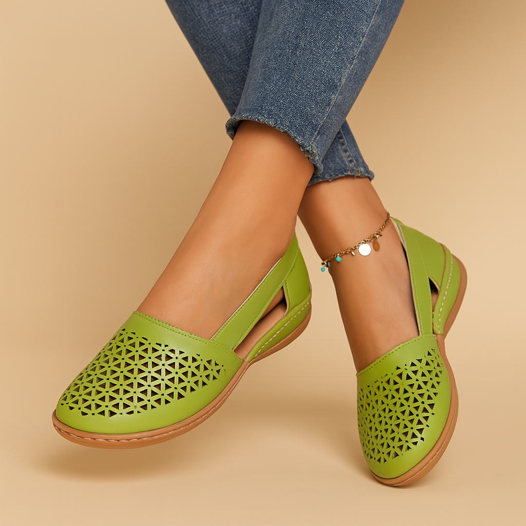 Women’s breathable slip-on shoes with cut-out details, flexible lightweight sole, and casual summer style in a comfortable design.