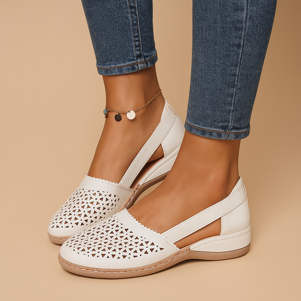 Women’s breathable slip-on shoes with cut-out details, flexible lightweight sole, and casual summer style in a comfortable design.
