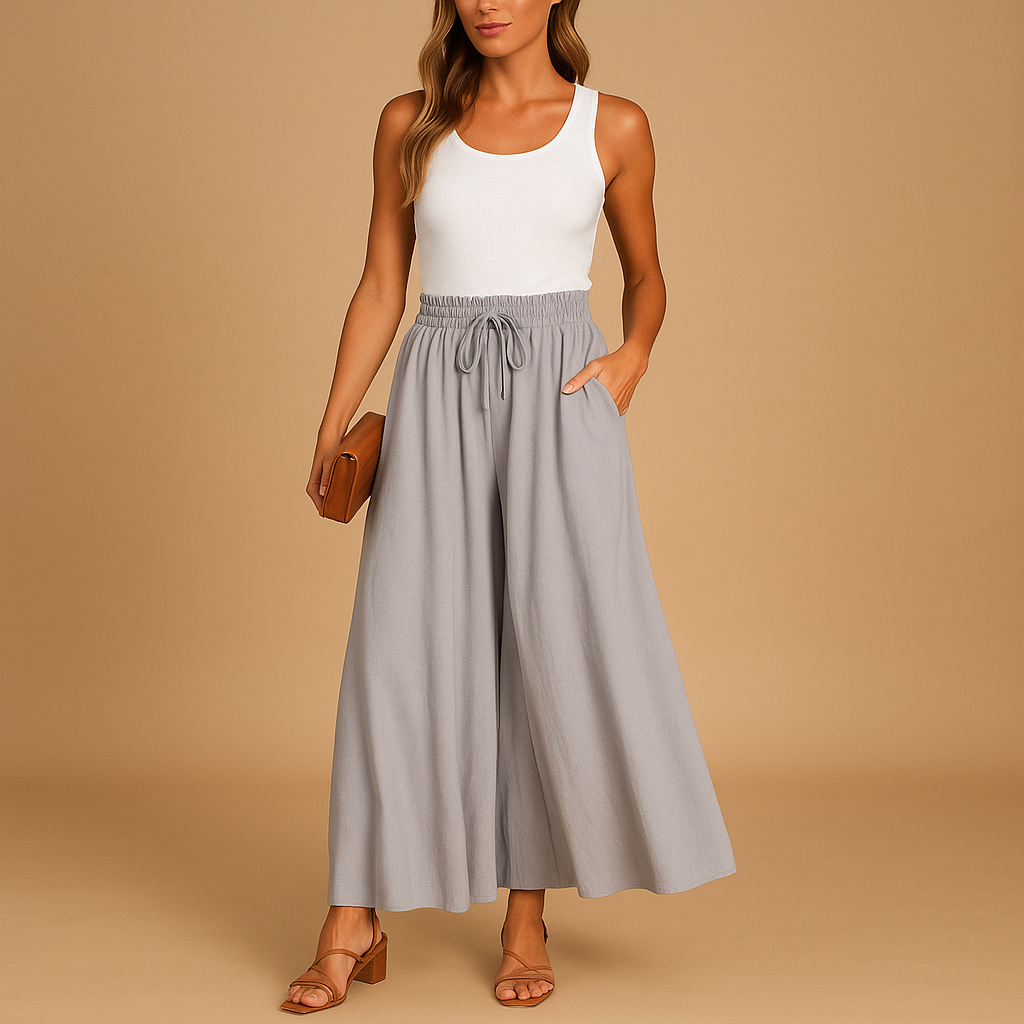 Women’s high-waisted wide-leg trousers with elastic waistband and modern chic cut, perfect for work or casual days