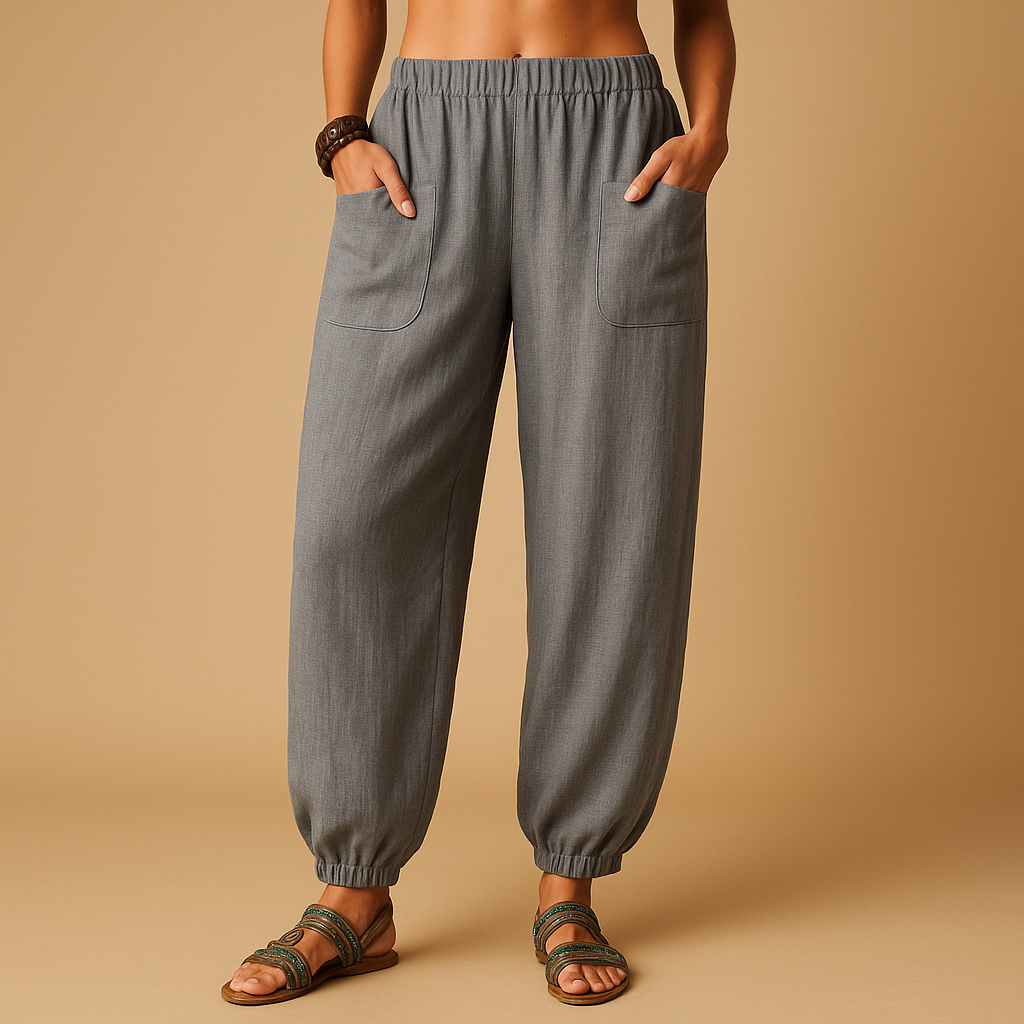 Women’s high-waisted linen boho trousers with a loose fit and functional pockets, ideal for summer days and relaxed outfits
