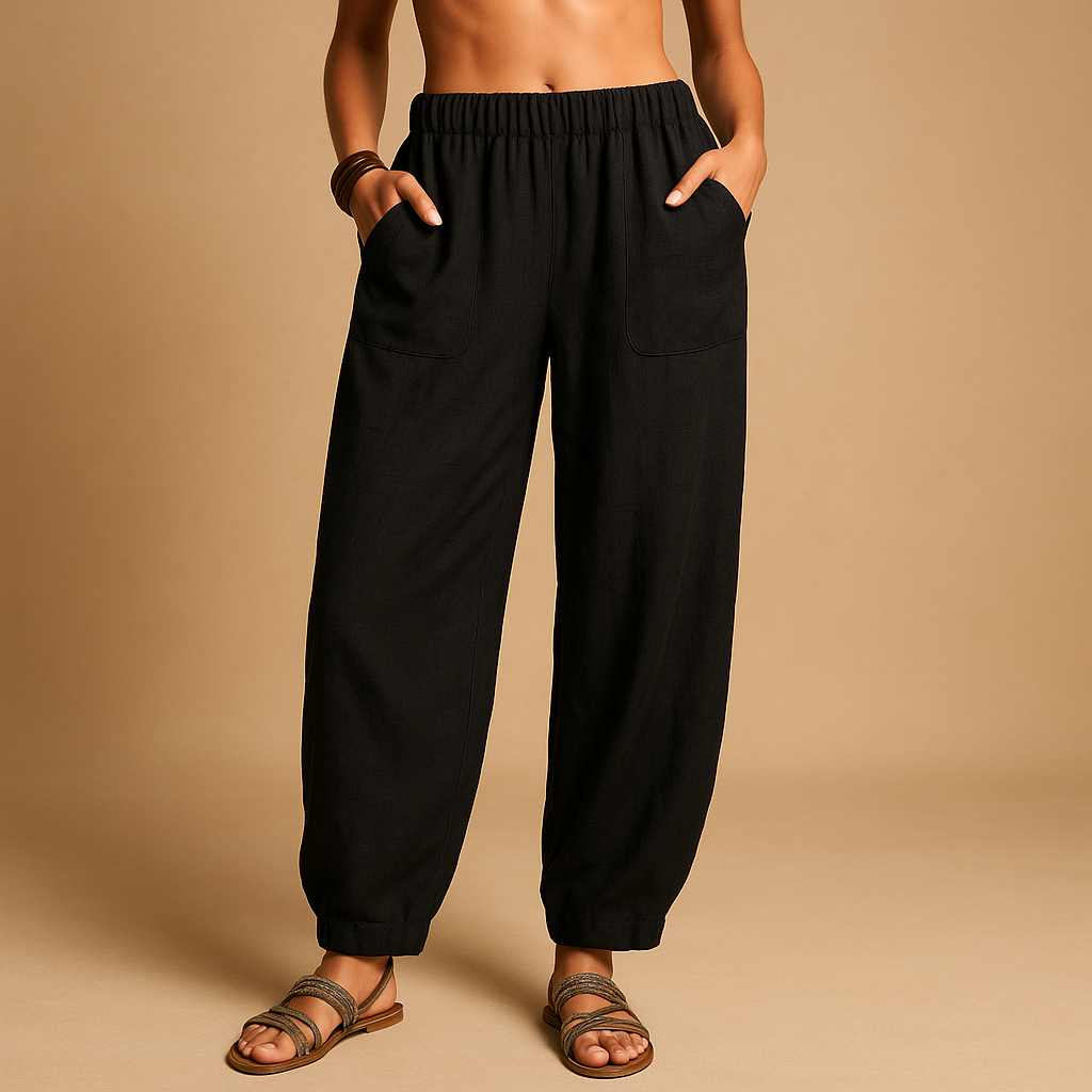 Women’s high-waisted linen boho trousers with a loose fit and functional pockets, ideal for summer days and relaxed outfits
