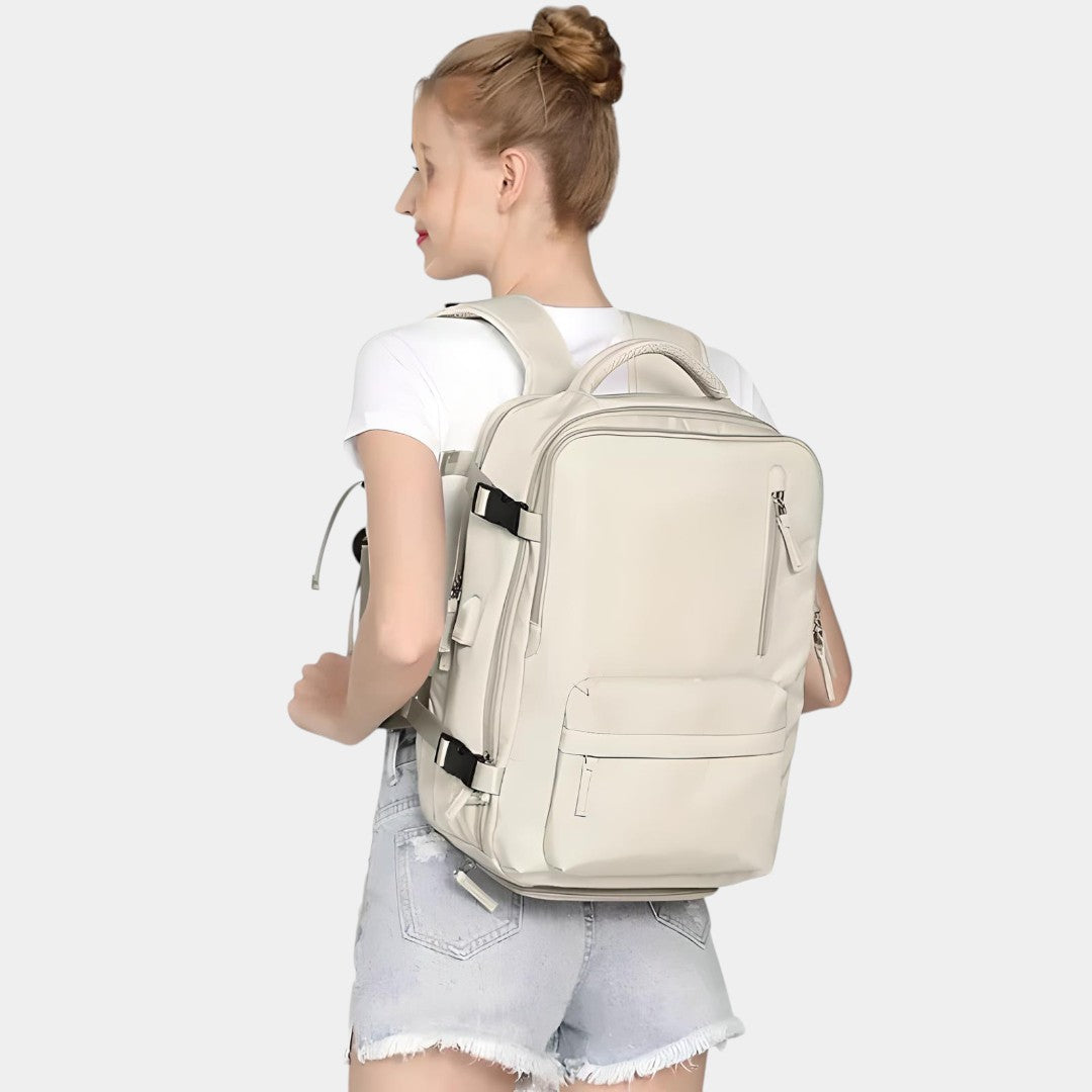 Women’s travel backpack with anti-theft pockets, laptop sleeve, wet compartment, and 180° flip opening for organised travel