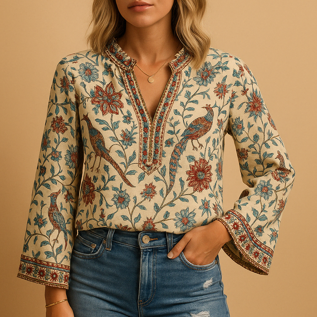 Airy spring blouse for women with a round neckline and flowy fit, ideal for warm-weather occasions and stylish everyday outfits.