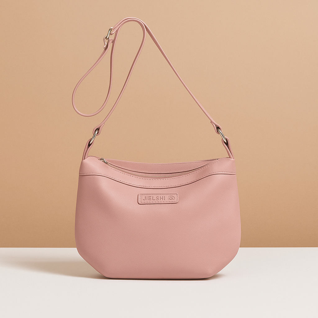 Waterproof anti-theft crossbody travel bag for women with wide strap, secure zip, and functional compartments for commuting or travel.