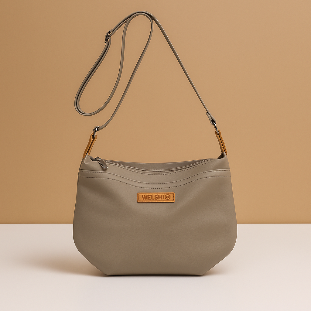 Waterproof anti-theft crossbody travel bag for women with wide strap, secure zip, and functional compartments for commuting or travel.