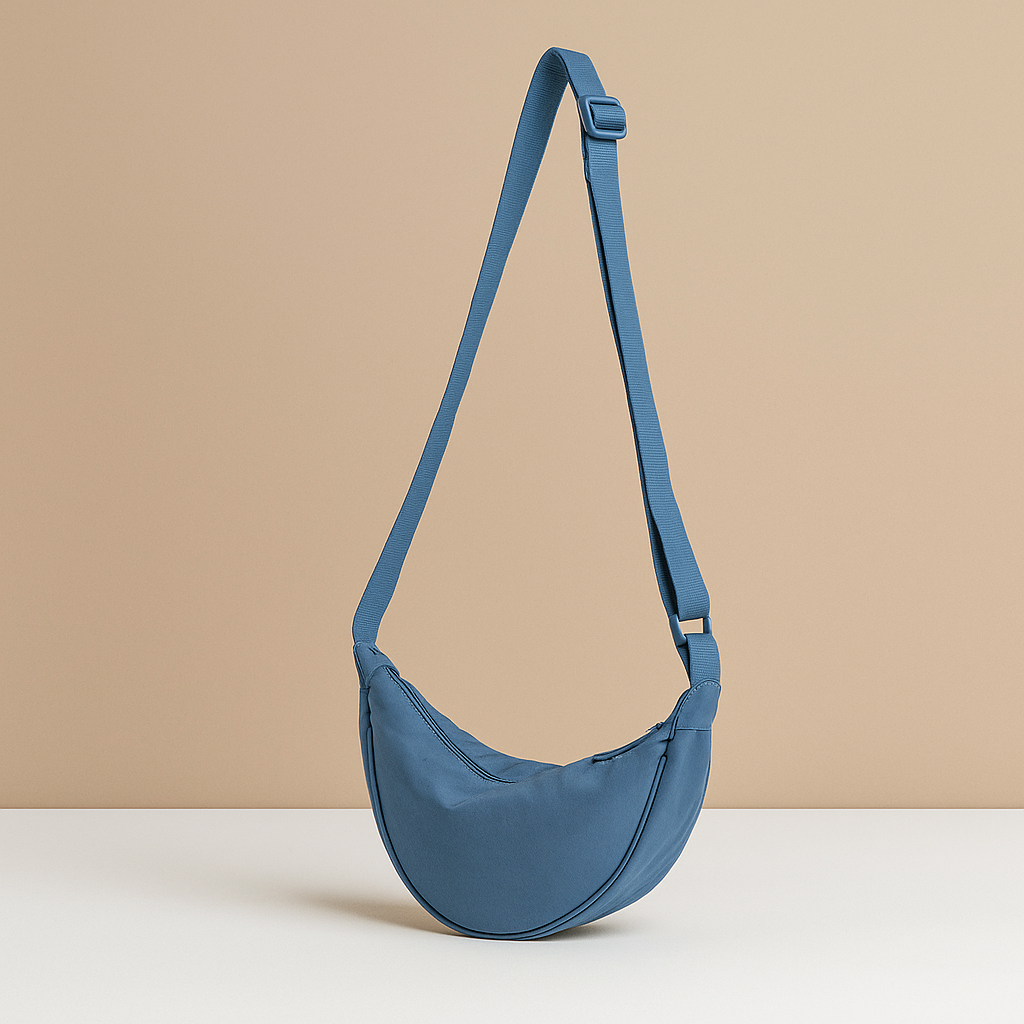 Anti-theft dumpling crossbody bag for women with ergonomic design, zippered closures, and secure strap for stylish daily wear and travel.