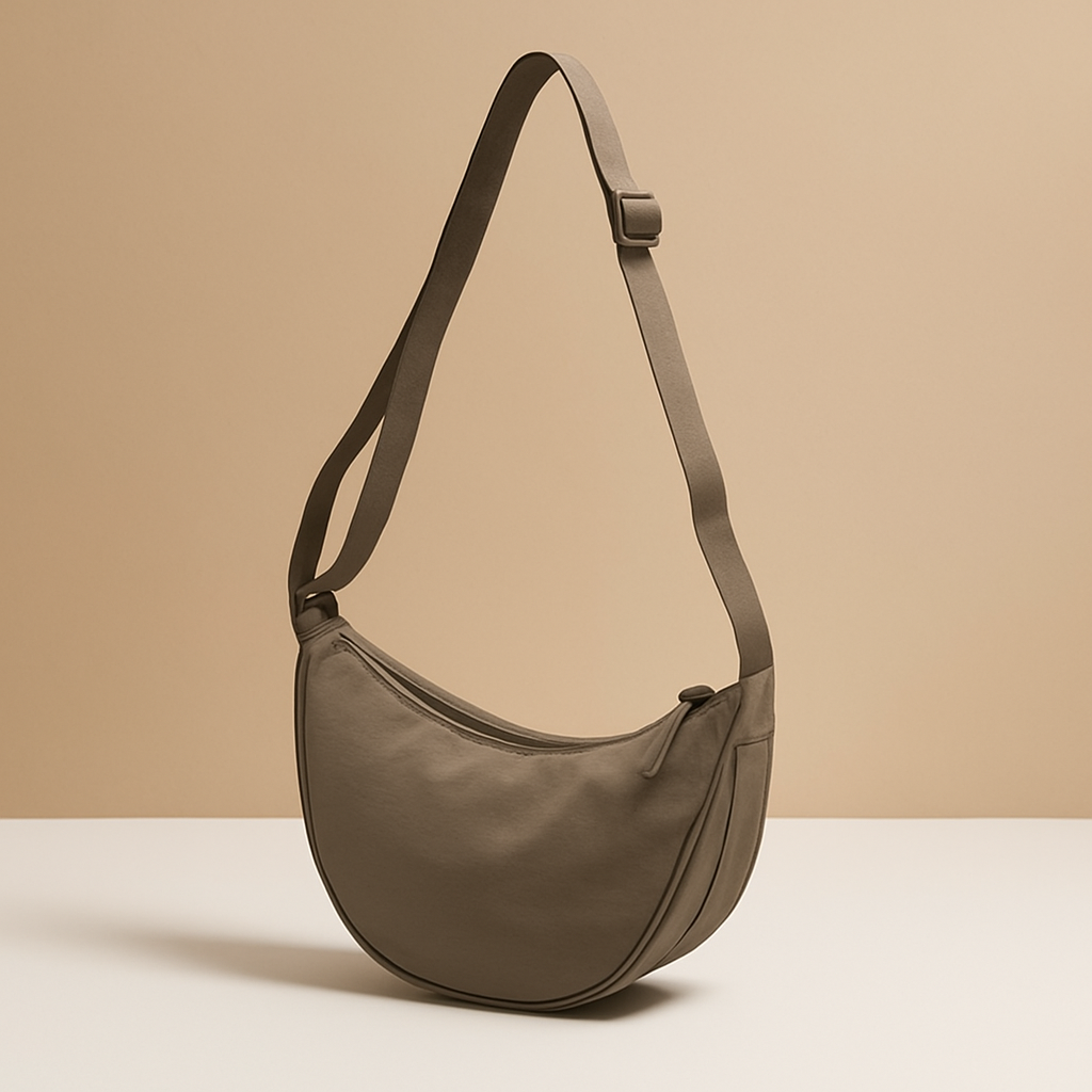 Anti-theft dumpling crossbody bag for women with ergonomic design, zippered closures, and secure strap for stylish daily wear and travel.