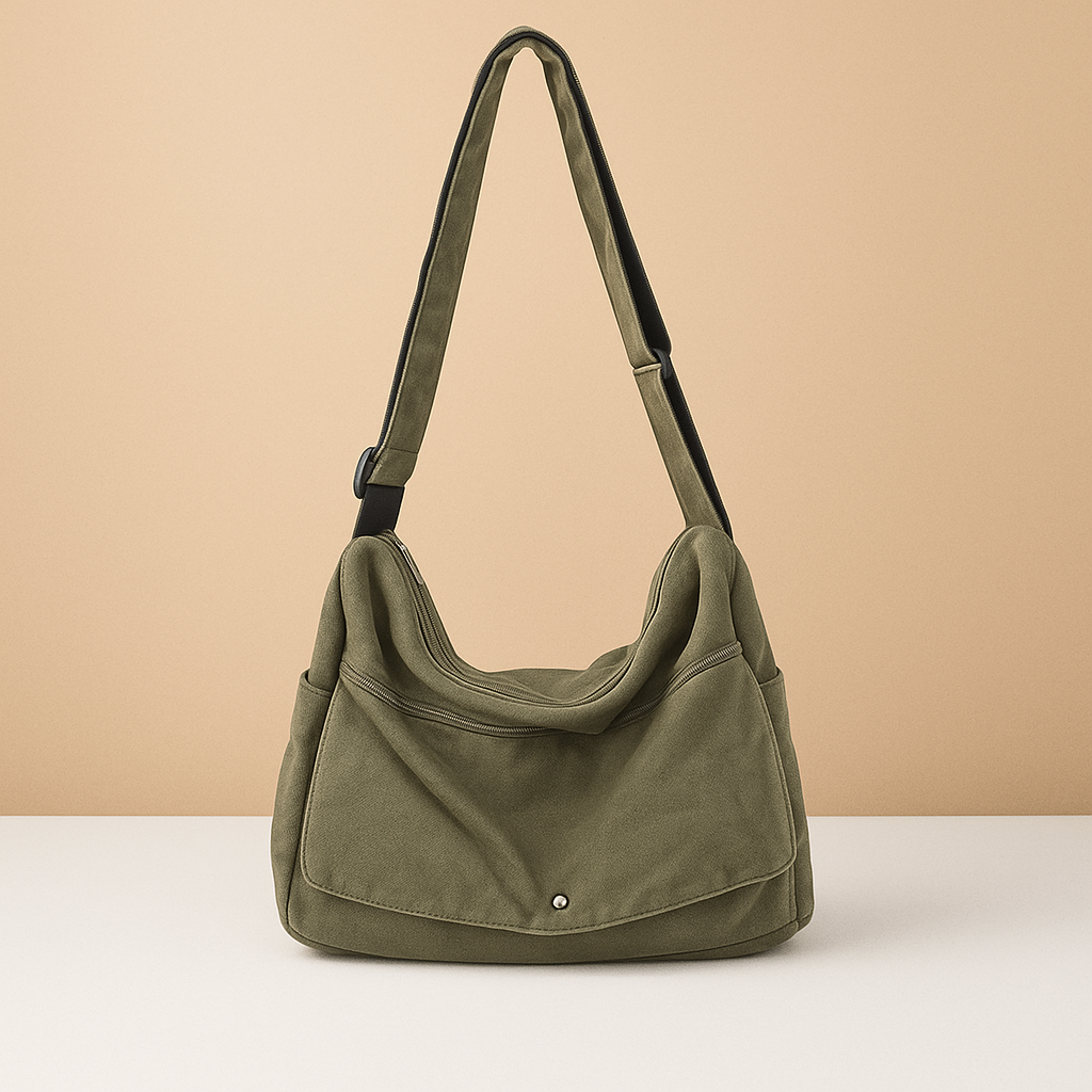 Canvas shoulder bag for women with roomy main compartment, outer pocket, and adjustable strap—ideal for work, travel, or daily use.