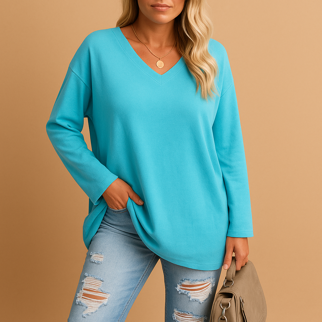Casual summer top for women with short sleeves and round neckline, available in soft breathable fabric and various bright colors.