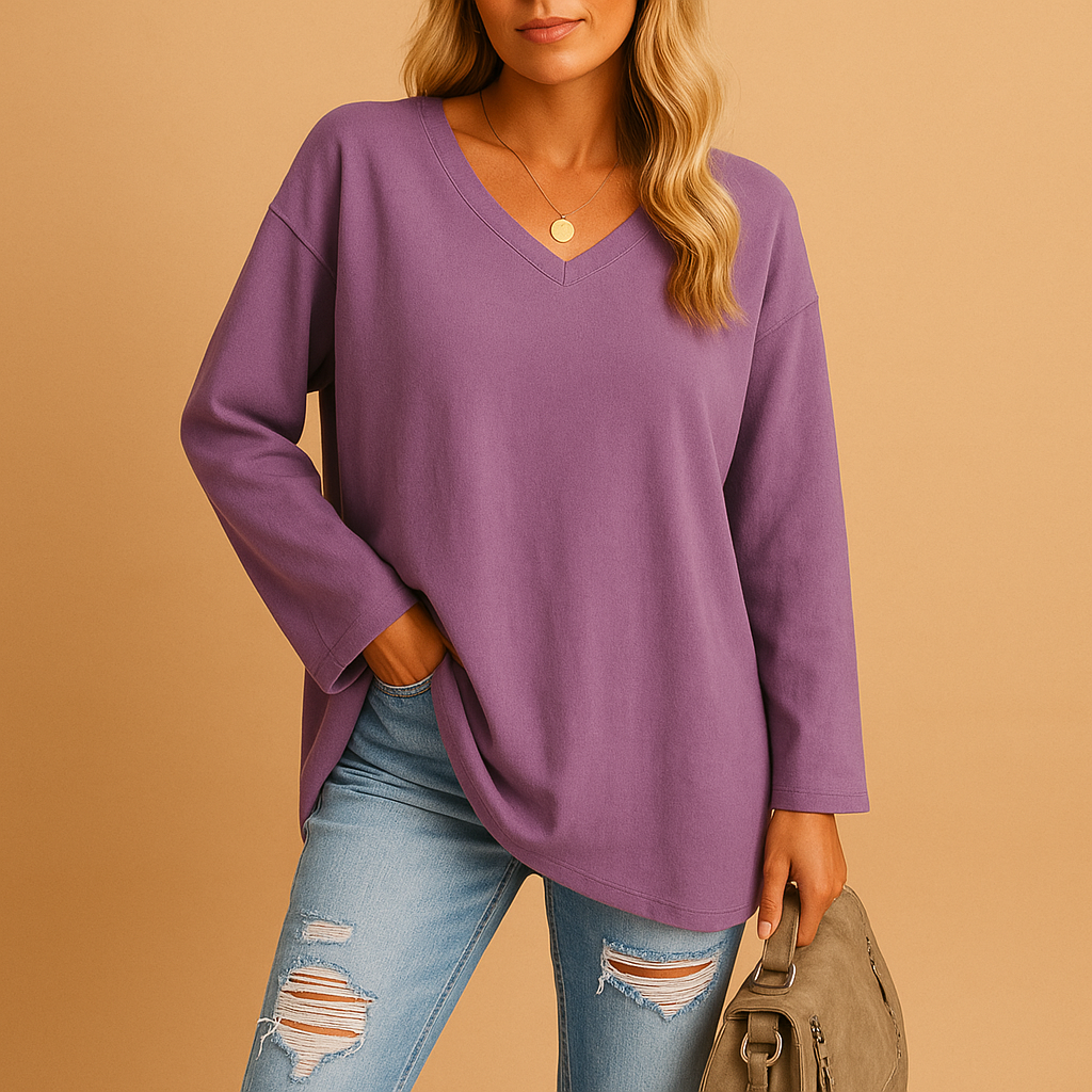 Casual summer top for women with short sleeves and round neckline, available in soft breathable fabric and various bright colors.