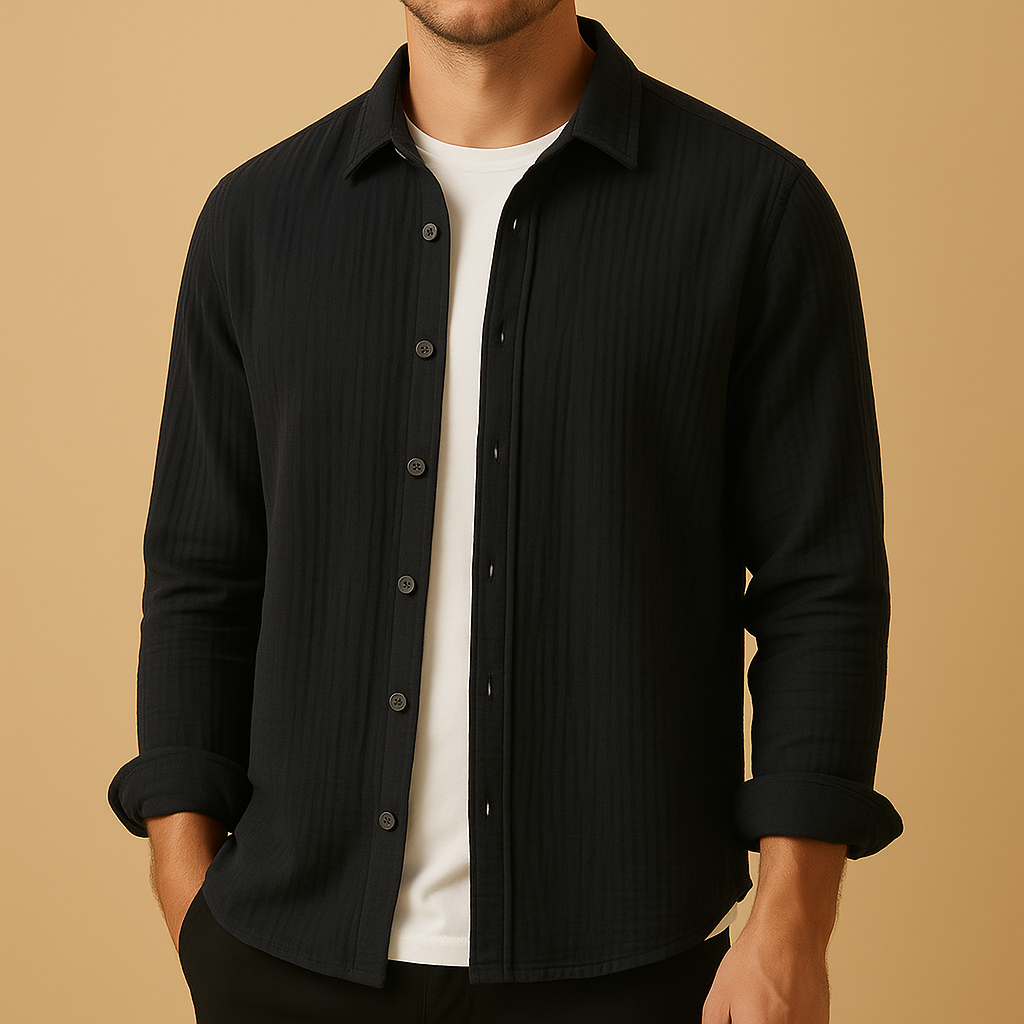 Men’s classic long sleeve button-down shirt with breathable fabric and slim fit, available in neutral and modern colours, perfect for casual or formal occasions.