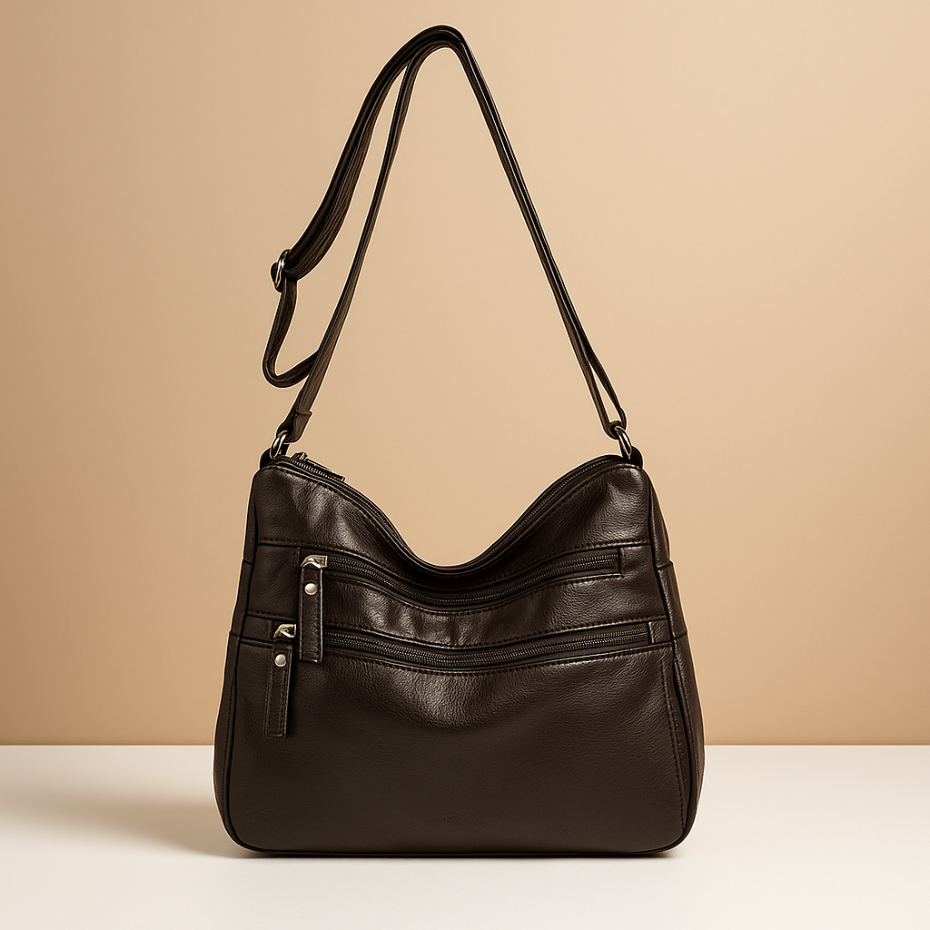 Compact anti-theft crossbody bag for women with secure zip closures, adjustable strap, and water-resistant design for everyday use.
