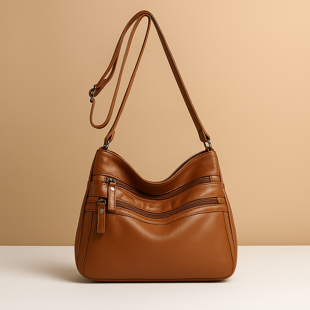 Compact anti-theft crossbody bag for women with secure zip closures, adjustable strap, and water-resistant design for everyday use.