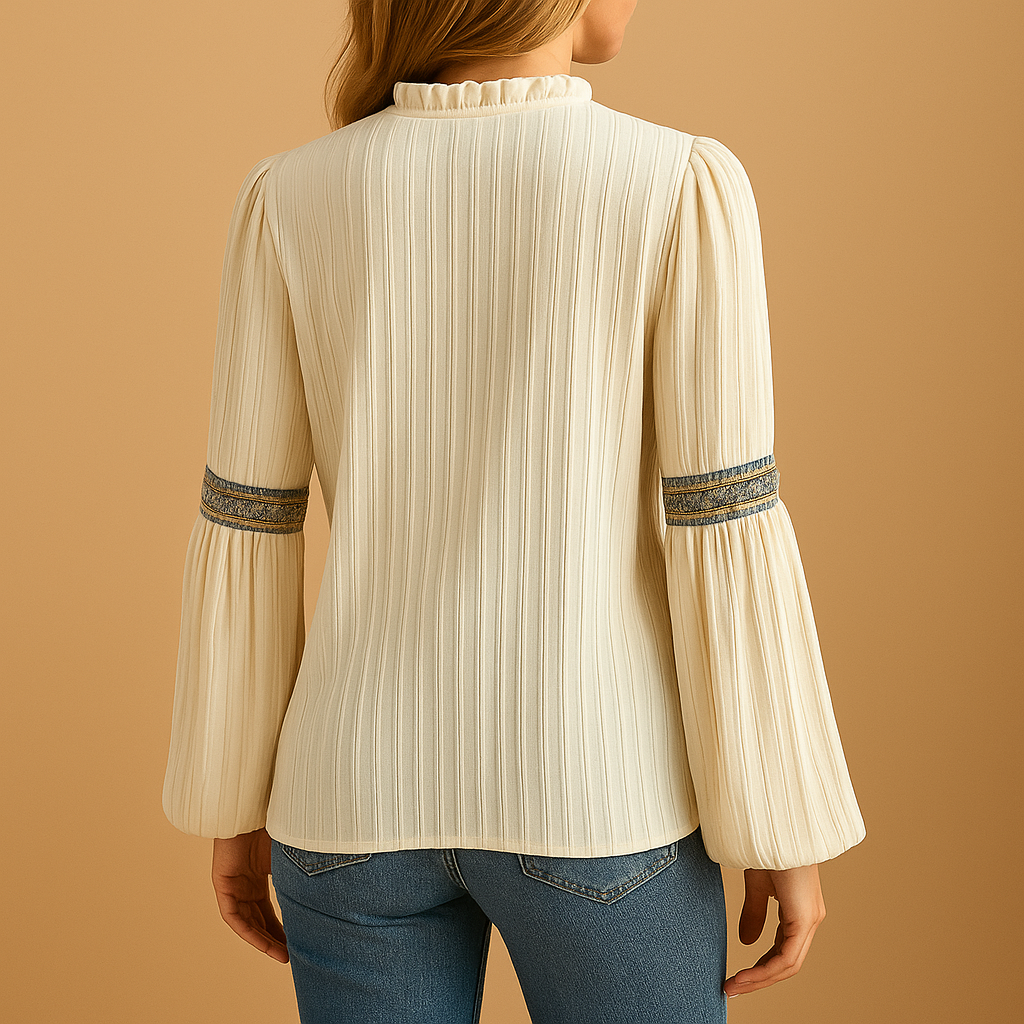 Elegant women’s blouse with lace patchwork and lantern sleeves, ideal for office outfits, evening occasions, or relaxed stylish days.