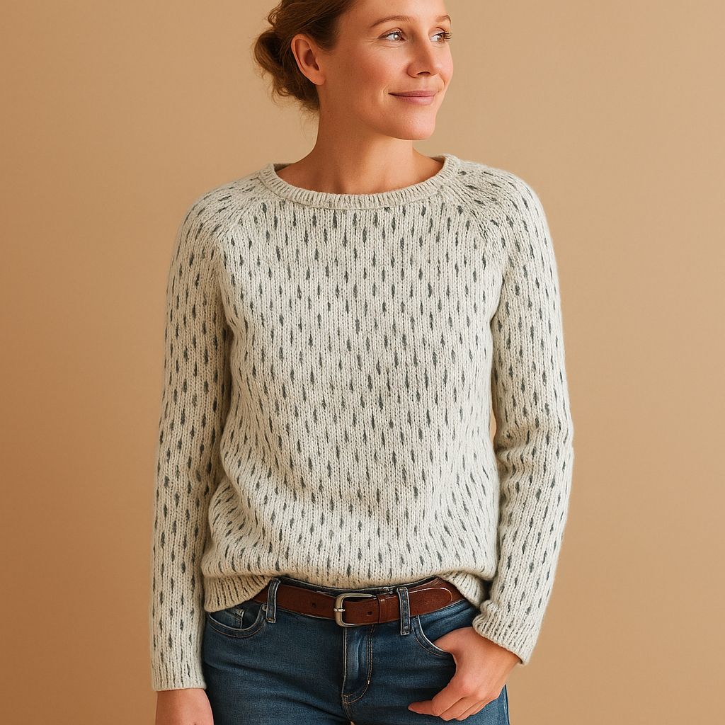 Women’s elegant grey knitted winter sweater with a soft breathable fit, perfect for layering during cold weather or wearing on its own.
