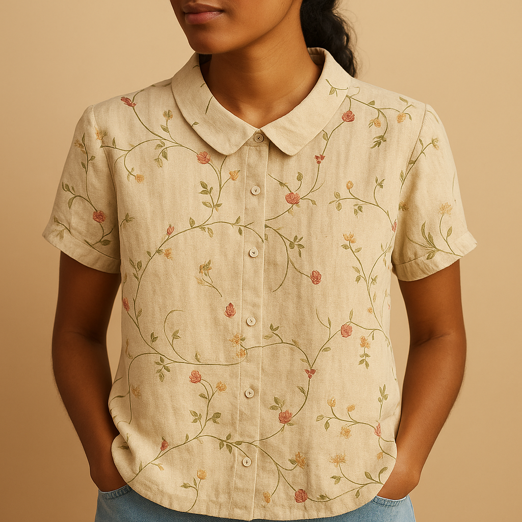 Women’s loose floral blouse with breathable fabric and multicolor flower pattern, ideal for casual summer days.