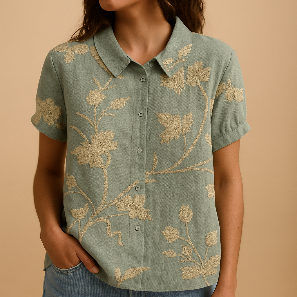 Women’s loose floral blouse with breathable fabric and multicolor flower pattern, ideal for casual summer days.