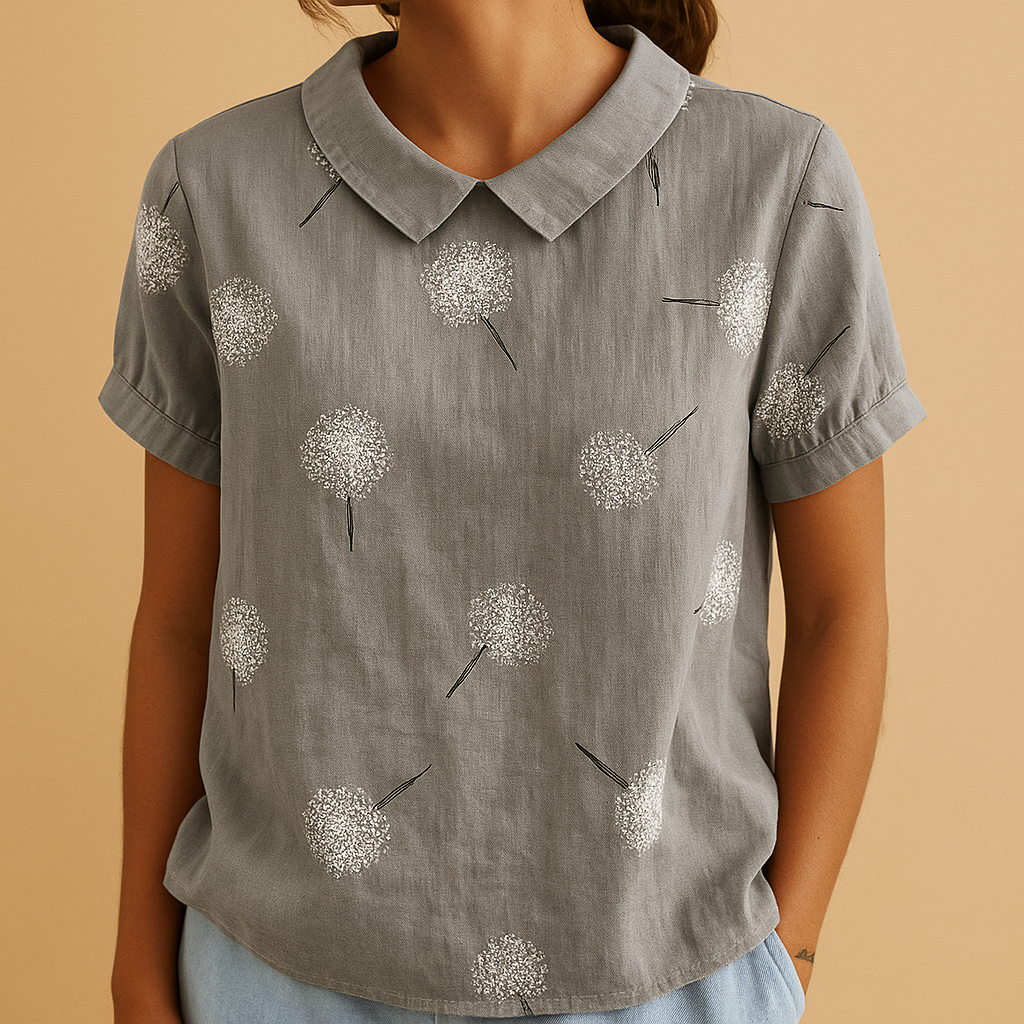 Women’s loose floral blouse with breathable fabric and multicolor flower pattern, ideal for casual summer days.