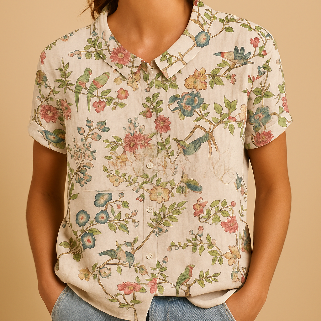Women’s loose floral blouse with breathable fabric and multicolor flower pattern, ideal for casual summer days.