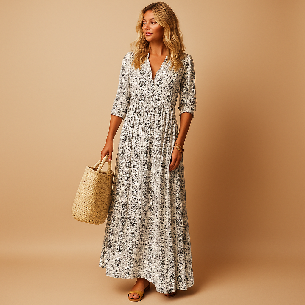 Knee-length summer dress for women with light and flowing fabric, perfect for spring walks, terrace evenings, and casual daytime wear.