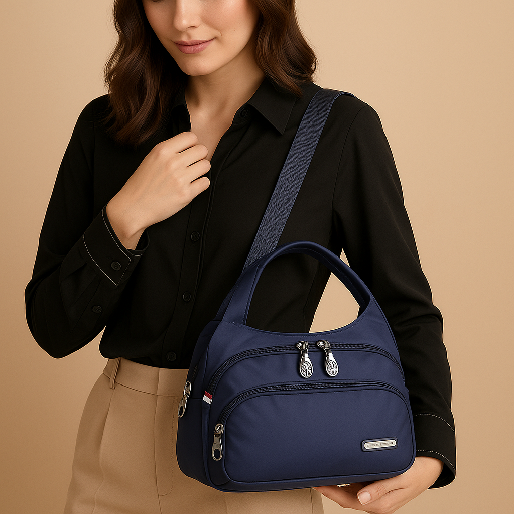 Lightweight messenger bag for women with multiple zippered compartments, hidden anti-theft pocket, and adjustable strap, ideal for travel and everyday use.