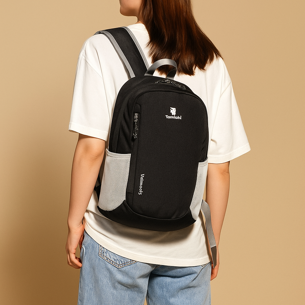 Lightweight waterproof backpack for women with 20-litre capacity, ergonomic straps, and foldable design for travel, hiking, or daily adventures.