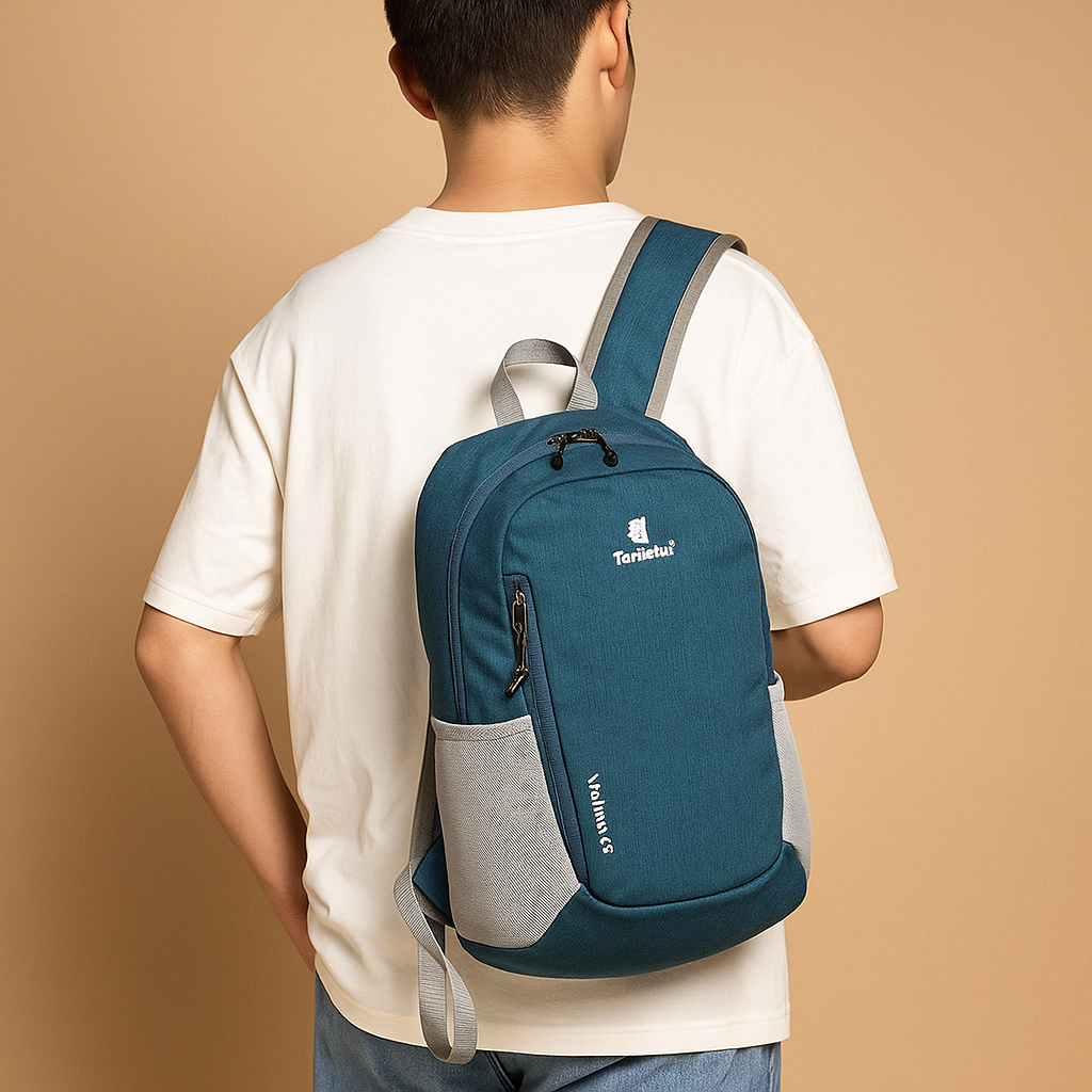 Lightweight waterproof backpack for women with 20-litre capacity, ergonomic straps, and foldable design for travel, hiking, or daily adventures.