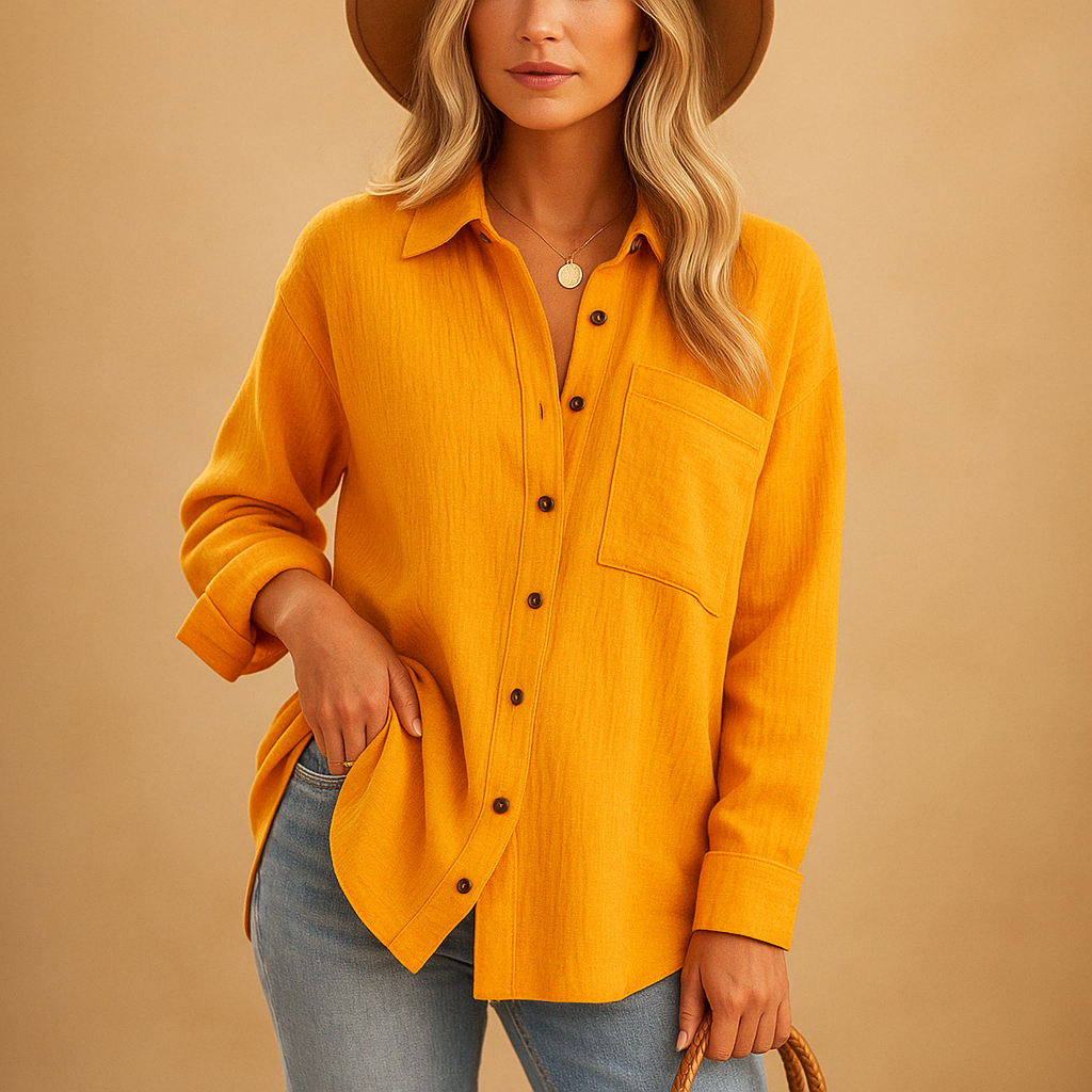 Long sleeve polo shirt for women in cotton blend with button-up collar and chest pocket, perfect for work or casual wear.