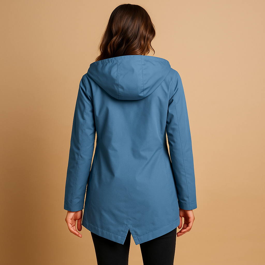 Long waterproof raincoat for women in beige with adjustable hood, breathable fabric, and full-length design, perfect for wet weather