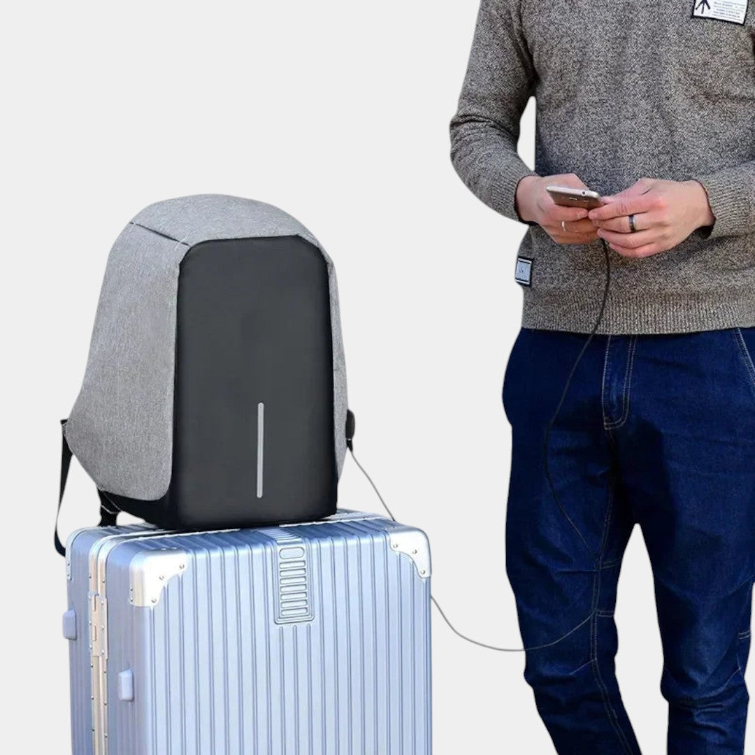 Men’s anti-theft laptop backpack with USB charging, hidden back-zipper, spacious compartments, and water-resistant design for commuting or travel