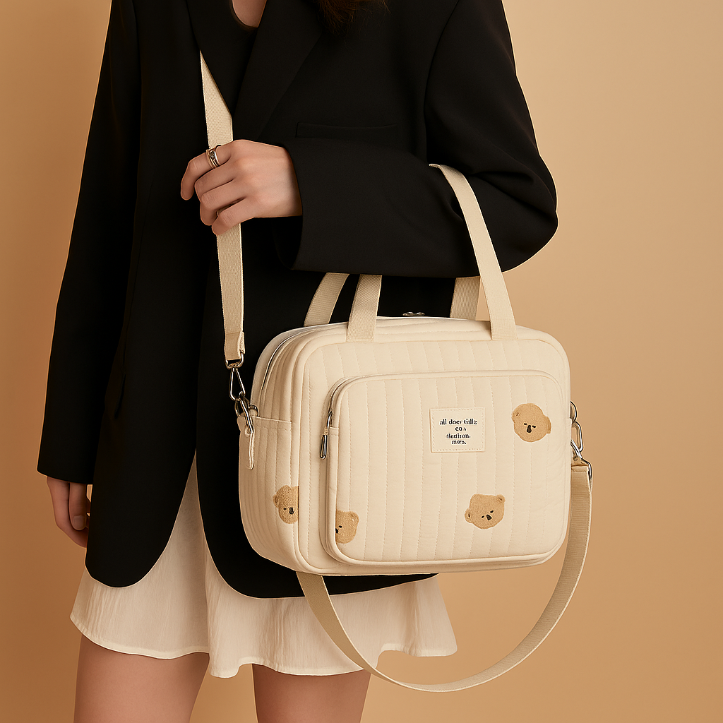 Quilted baby travel bag for women with insulated interior, cushioned design, and multiple compartments—perfect for on-the-go mums and daily baby care.