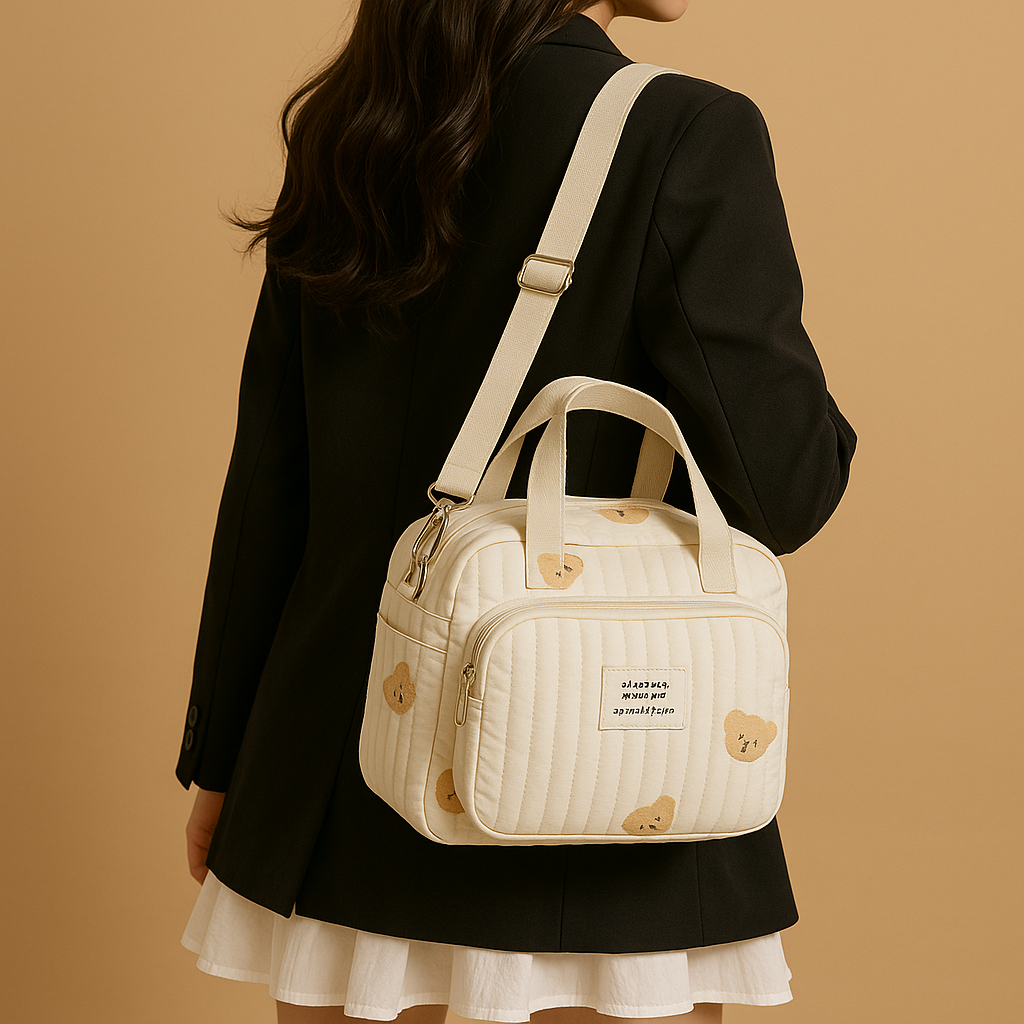 Quilted baby travel bag for women with insulated interior, cushioned design, and multiple compartments—perfect for on-the-go mums and daily baby care.