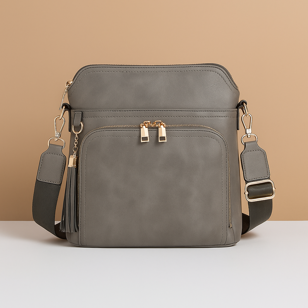 Women's RFID crossbody bag with anti-theft pocket and water-resistant faux leather exterior, convertible to clutch with tassel detail