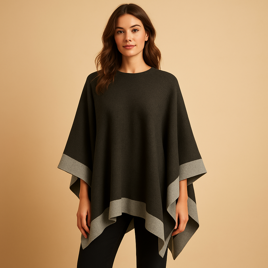 Women’s soft faux cashmere poncho in elegant design, ideal for layering in autumn and winter outfits.