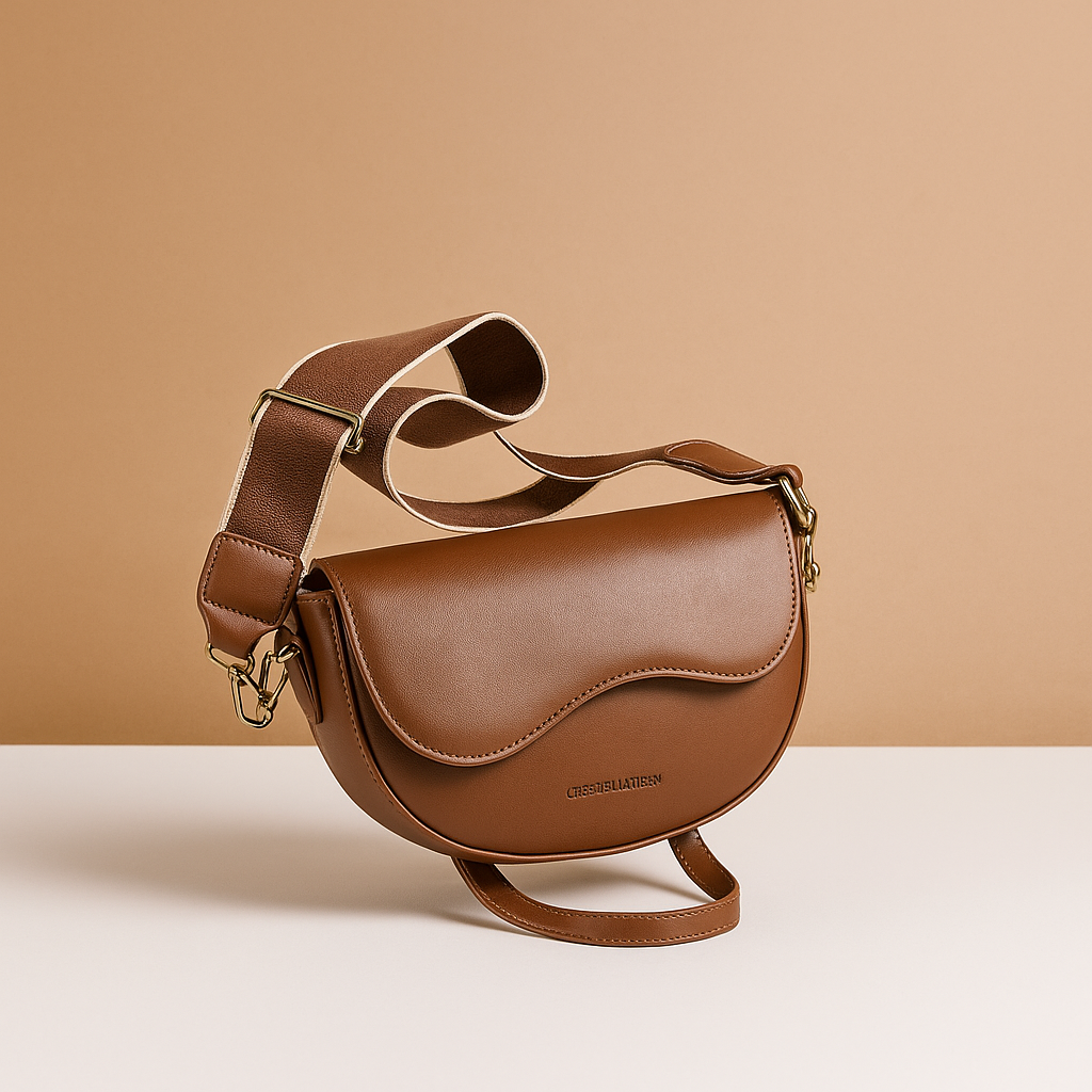 Vintage saddle crossbody bag for women with classic flap closure, adjustable strap, and organised compartments for daily use.