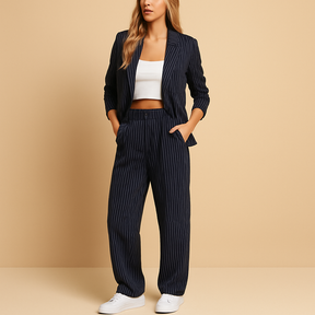 Women’s blazer and trouser set in navy or grey, with a tailored fit for formal and casual occasions