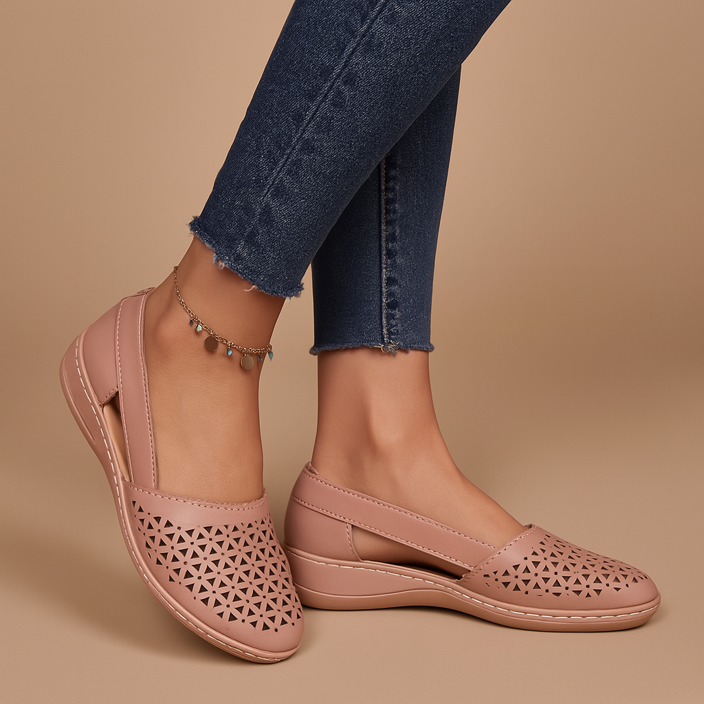 Women’s breathable slip-on shoes with cut-out details, flexible lightweight sole, and casual summer style in a comfortable design.