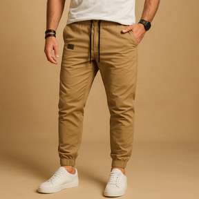 Men’s cargo trousers with multiple side pockets, relaxed fit, and straight legs in black, grey, beige, and green for casual or outdoor wear.