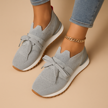 Comfortable lace-up sneakers for women with cushioned insole, breathable upper, and non-slip sole, ideal for everyday wear and city walks.
