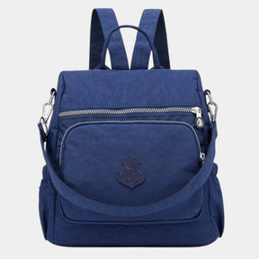 Women’s convertible backpack with anti-theft features and water-resistant design, ideal for travel and everyday use