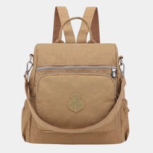 Women’s convertible backpack with anti-theft features and water-resistant design, ideal for travel and everyday use