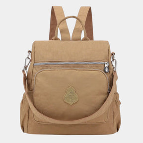 Women’s convertible backpack with anti-theft features and water-resistant design, ideal for travel and everyday use