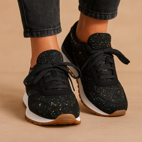 Stylish women’s glitter sneakers with sequins in silver, gold, and black, perfect for casual wear or festive occasions.