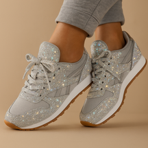 Stylish women’s glitter sneakers with sequins in silver, gold, and black, perfect for casual wear or festive occasions.