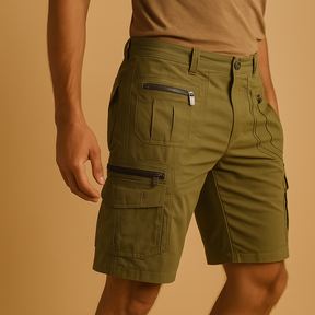 Men’s knee-length cargo shorts with multiple zip and flap pockets in sand, army green, black, and dark grey, ideal for outdoor and casual wear.