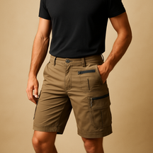 Men’s knee-length cargo shorts with multiple zip and flap pockets in sand, army green, black, and dark grey, ideal for outdoor and casual wear.