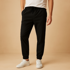 Men’s knitted winter trousers with thick warm fabric, elastic waistband, and drawstring, ideal for casual winter wear and home comfort.