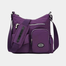 Lightweight anti-theft crossbody bag for women with adjustable strap, secure compartments, and weather-resistant material for daily use.